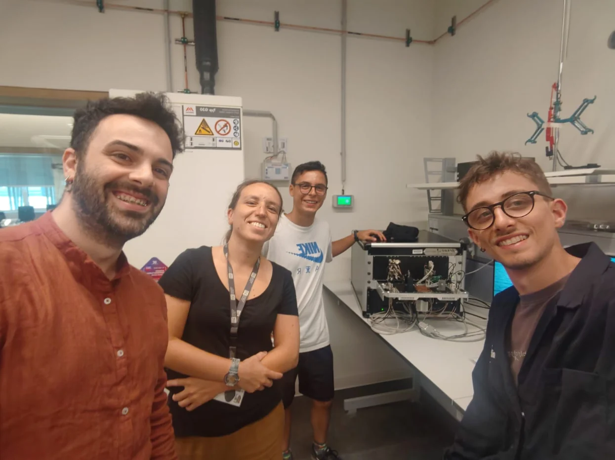 Laboratory team beside an installed ARKEO measurement platform